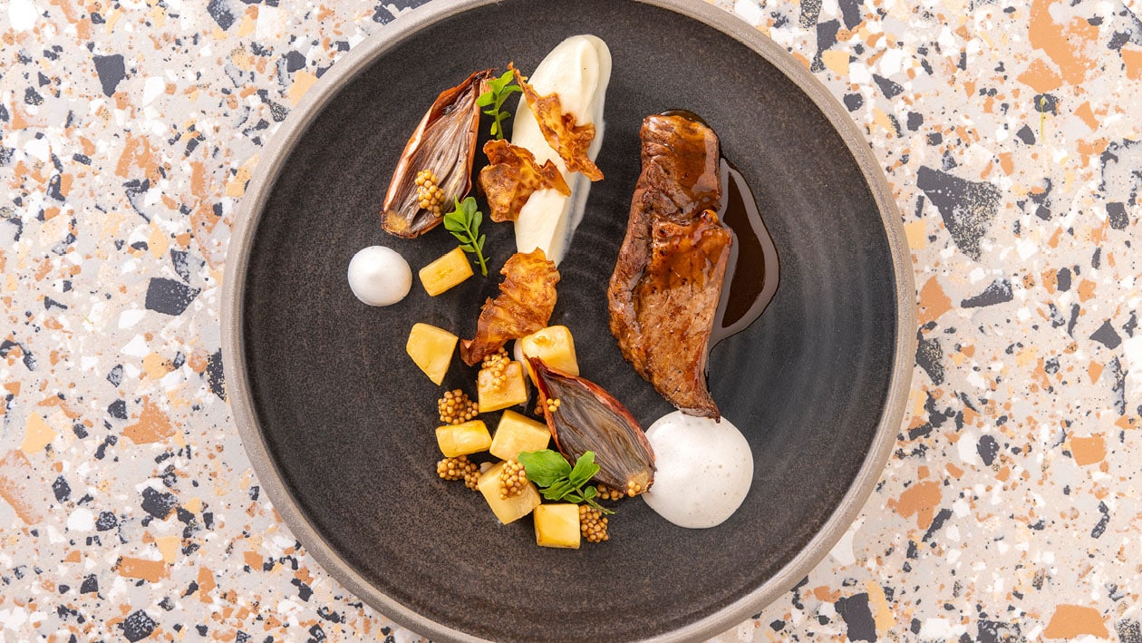 Ribeye met knolselder en espuma van mergpijp Recept